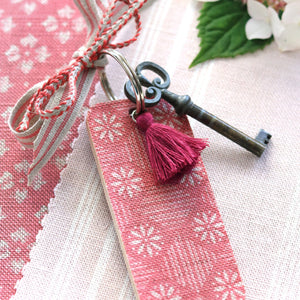 Tilly Tassel Keyring - Natural On Raspberry