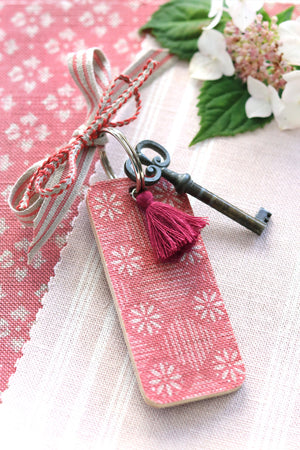 NEW Tilly Tassel Keyring - Natural On Raspberry